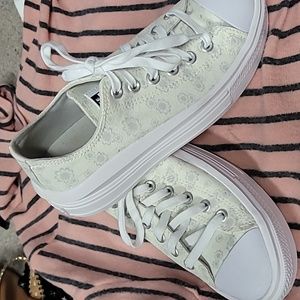 EUC Converse platform sneakers.  Light yellow with gray flowers. Size 7.